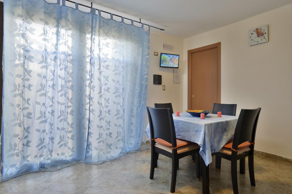Appartamento Le Palme Alghero Rom bilde